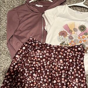 Chic Mauve Jacket with Floral Skirt and Graphic Tee